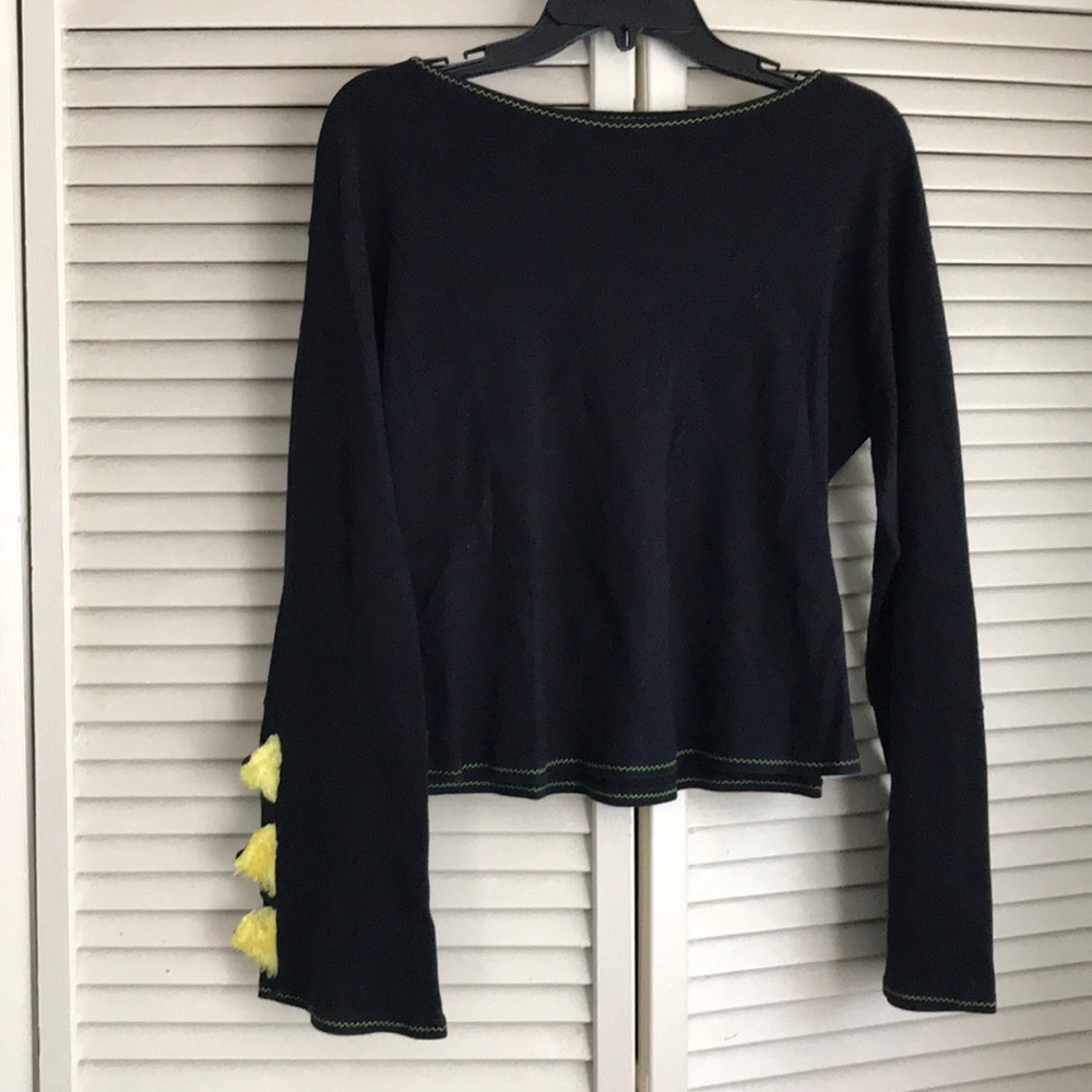 Black long sleeves with fuzzy dino wrist plates